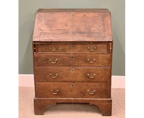 ANTIQUE OAK BUREAU - sloped fall front with interior drawers and pigeon hole arrangement with central cupboard door over four