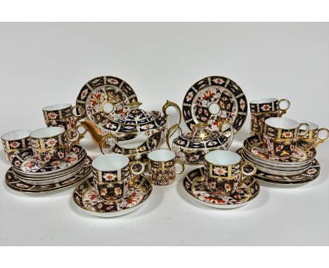 A Royal Crown Derby thirty piece coffee service complete with ten coffee cans with circular loop handles to side, (h 6cm x 6c