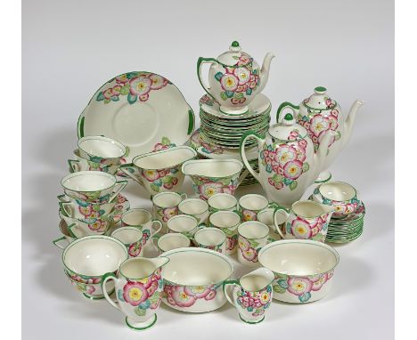A Royal Doulton "Plaza"1920's style part tea service decorated with pink peonies and green gilding, comprising twelve espress