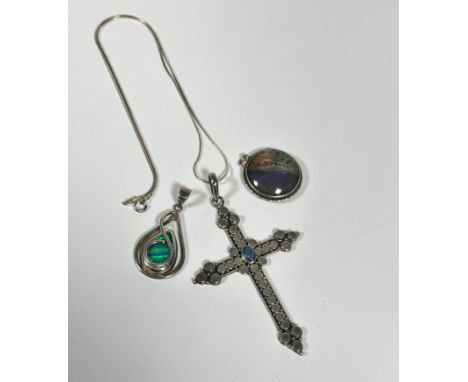 A silver cross mounted with opal cabouchon on fine trace link chain, (31cm) a silver circular butterfly pendant (d 3cm) and a