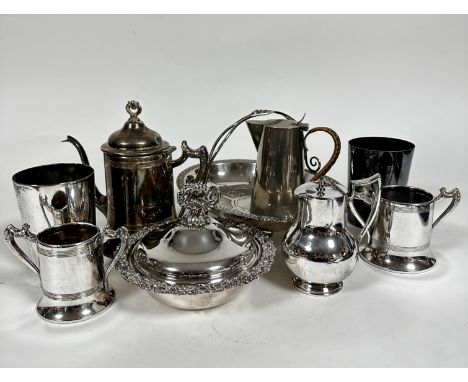 An Epns oval engraved cake basket, an Epns three part tea service, two Epns engraved tankards, an Epns muffin dish, etc
