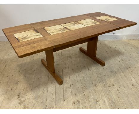AM Mobler, a Danish teak and tile top extending dining table, raised on panel end and sledge supports, H73cm, L192cm, D90cm
