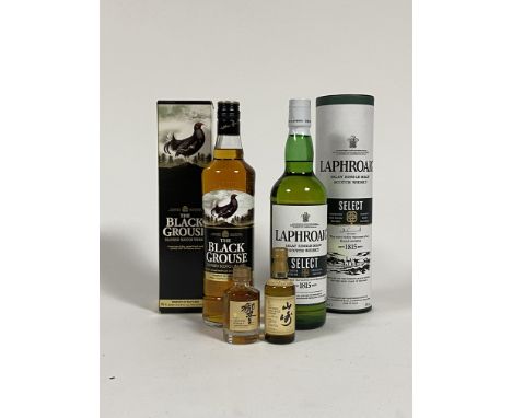 A 70cl bottle of Black Grouse blended Scotch Whisky, a 70cl bottle of Laphroaig islay single malt Scotch Whisky, and two Sunt