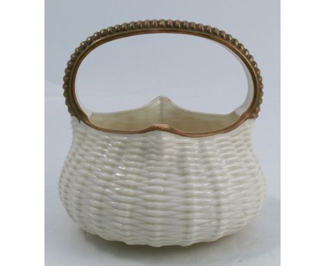 A Royal Worcester gilded ivory basket, with basket weave body and moulded handle, dated 1881, height 6.5insCondition Report: 