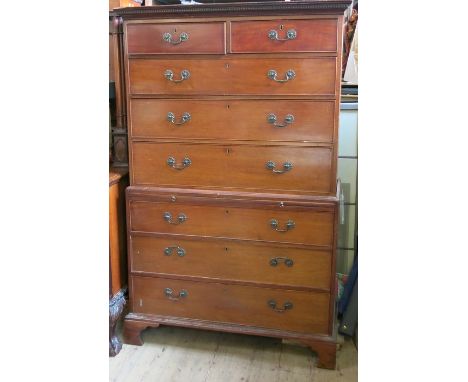 A 19th century mahogany chest on chest, with dentil cornice over two short over three long graduated drawers, the base with b