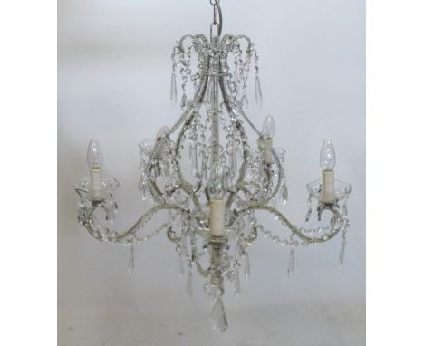 A glass and metal chandelier, with scrolling branches, swags and droppers, height 34ins, together with a smaller similar exam