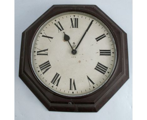 A G.P.O bakelite cased wall clock, of octagonal form, with Roman numerals to the white dial, af, overall height 16.5ins