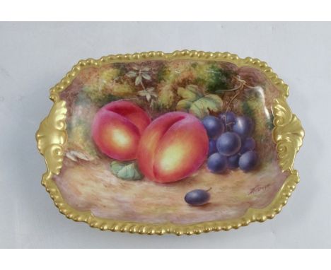 A Royal Worcester dish, decorated with fruit to a mossy background by Freeman, with shaped gilt edge, dated 1953, 5ins x 7ins