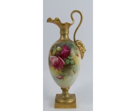 A Royal Worcester ewer, decorated with roses by F Harper, with gilt mask below the handle and raised on a square pedestal foo