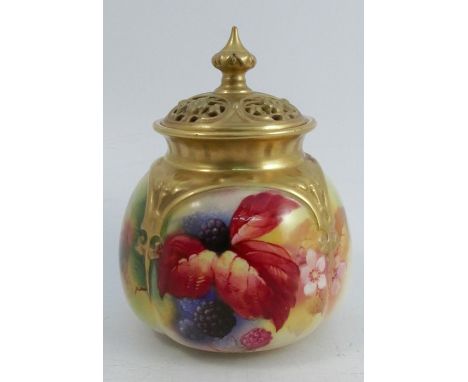 A Royal Worcester quarter lobed covered vase, with pierced gilt cover, the body decorated with Autumnal berries, flowers and 