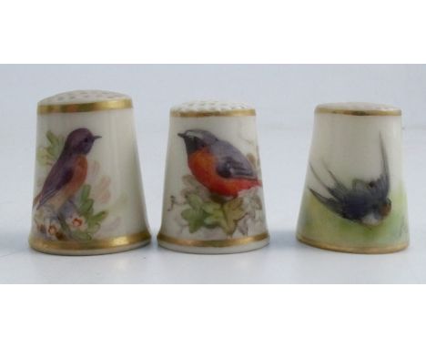 Three Royal Worcester thimbles, all painted with British birds, one signed by PowellCondition Report:  one cracked