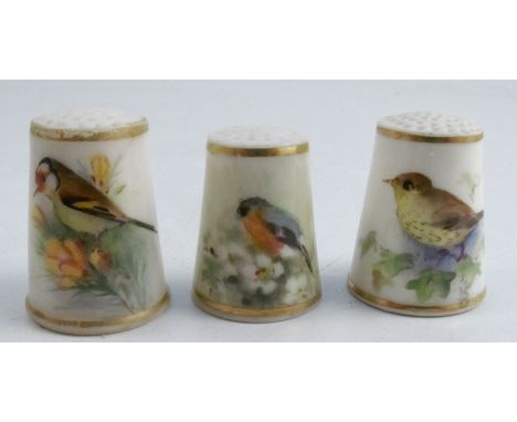Three Royal Worcester thimbles, all painted with British birds, one signed by PowellCondition Report:  one cracked