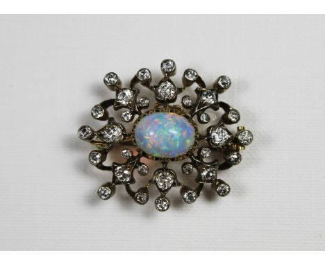 Viktorianische Brosche, England, ca. 1870, Gold 18 Karat, Silber, Brillanten zus. ca. 2,0 ct,  Opal ca. 3 ct, Gesamtgew.: 9,1