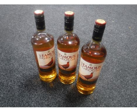 Three 1 litre bottles of Famous Grouse Blended Scotch Whisky