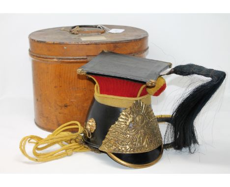 A Victorian officer's lance cap of The Fifth Royal Irish Lancers, with black, square, tooled leather top with brass-capped co