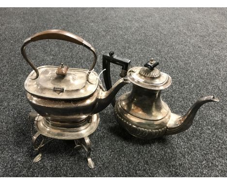 A silver plated spirit kettle on stand and a teapot