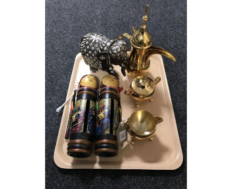 A tray of hardwood and ivory inlaid elephant, three piece Arabic gold plated tea service, pair of wooden Indonesian dolls  