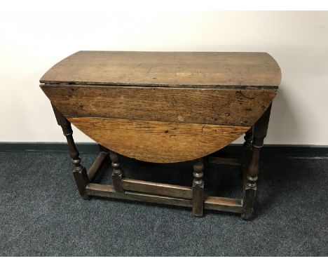 A 19th century oak gate leg table 