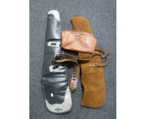 A box containing leather ammunition belt, leather pouch, two shotgun carry bags