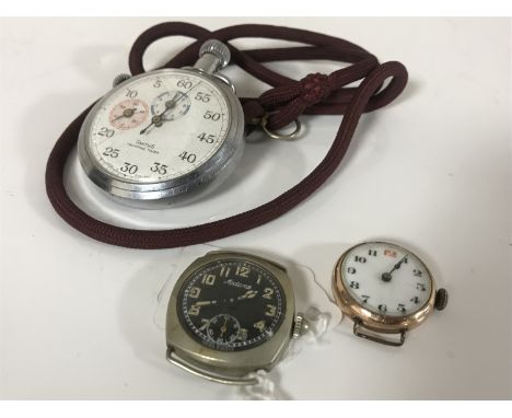 A mid 20th century Smiths Yachting Timer in chrome plated case and a yellow metal watch face and one further watch dial of th