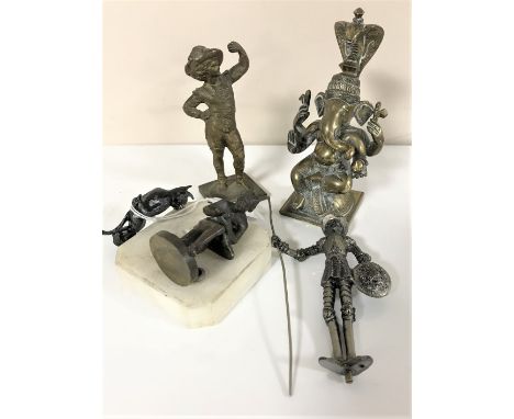 An early 20th century metal figure depicting Felix The Cat, together with four further bronze, brass and metal figures (4)