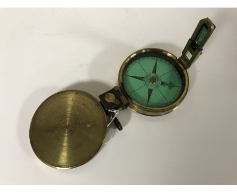 A 19th century brass compass signed James J. Robertson