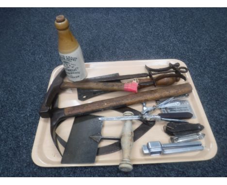 A tray of vintage ice packs, meat cleaver and sharpener, brick hammer, toffee hammer, nut cracker, pocket knife etc 