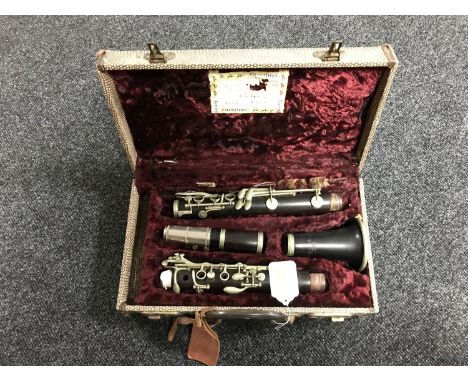 A four piece console clarinet by Selmer of London, in a fitted box 