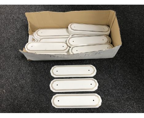 A box of ceramic finger plates 