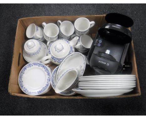 A box of Bosch Tassimo coffee machine and Boots Avignon tea and dinner service 