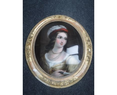 A 19th century reverse painting on glass, portrait of a lady wearing a red bonnet, in an ornate gilt frame  CONDITION REPORT:
