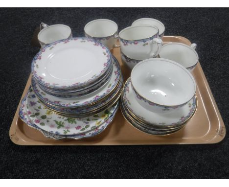 A tray of a twenty-four piece Paragon tea service decorated with pink flowers 