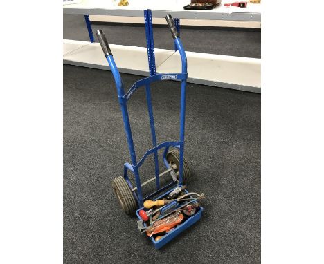 A sack barrow, plastic caddy of oil can and tools 