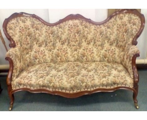 Victorian walnut double spoon back settee, scrolled frame, cabriole legs terminating on original castors, height 100cm, width