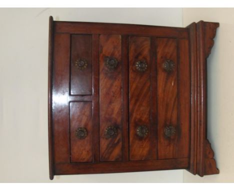 19th century miniature chest of drawers, two short drawers over three long drawers, bracket feet and glass knobs, height 43cm