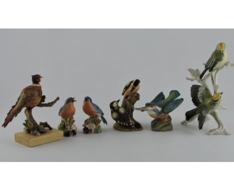 A Royal Worcester model of a kingfisher, together with three other Worcester bird models and two further examples. (6)