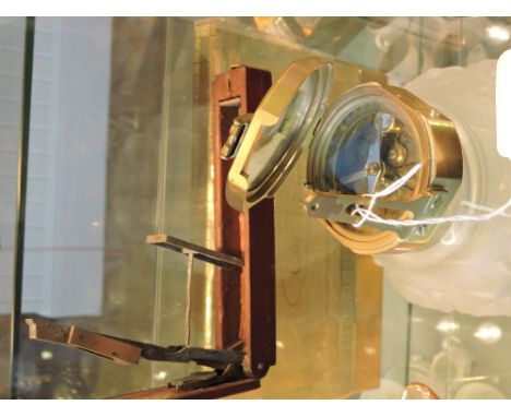 A set of Victorian sovereign scales and a brass nautical compass.