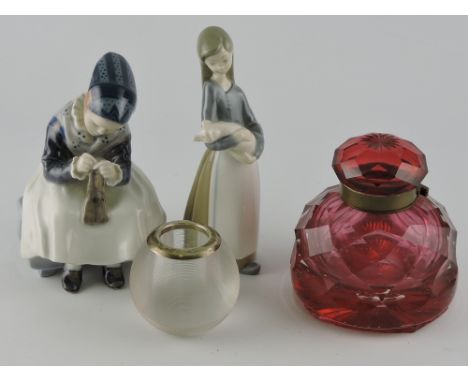 A Royal Copenhagen figure of a young girl knitting, H 15cm, together with a Lladro figure, faceted cranberry glass inkwell an