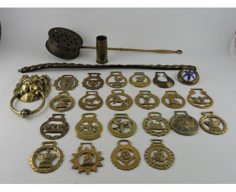 A small quantity of brassware, including horse brasses, door knocker and a chestnut roaster.