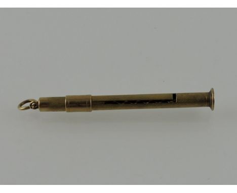 A 9ct gold engine turned cigar piercer, L. 6cm, 4.5g gross.