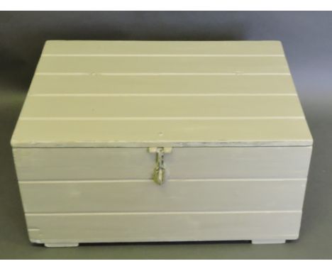 A duck-egg green painted trunk, of plank construction with distressed finish, iron hasp and handles, W. 68cm.