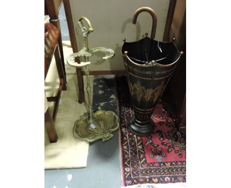 A Toleware umbrella / stick stand modelled as an upturned umbrella together with a reproduction brass umbrella stand.