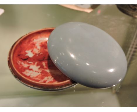 A light blue glazed Chinese circular lidded make-up pot, with double line decoration to foot rim, D. 8cm.