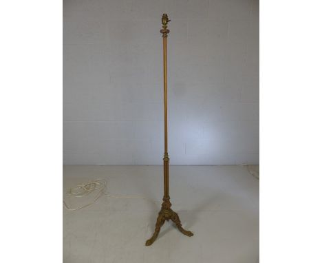 Brass and copper lamp stand on tripod serpent feet