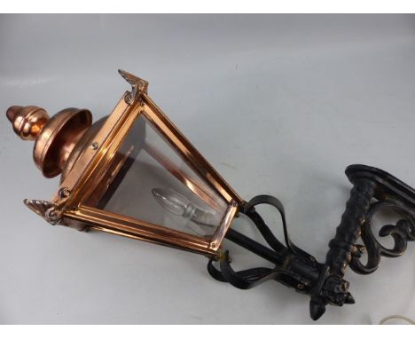 Copper street lamp on iron bracket converted for electricity