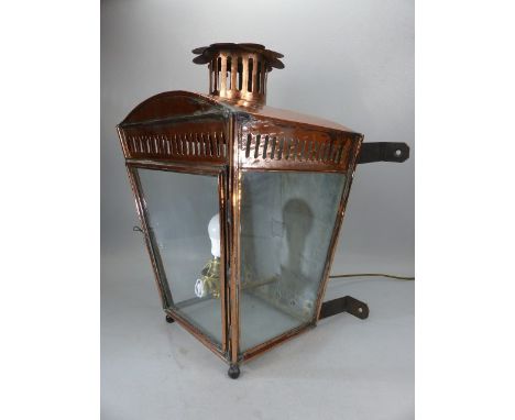 Copper wall mounted, glass-fronted street lamp.  Height approx. 52cm