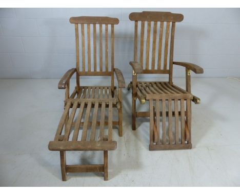 Pair of teak garden steamer chairs