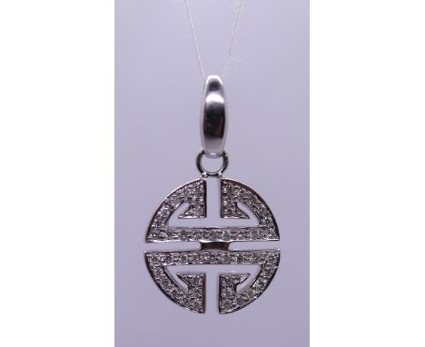 18ct white gold diamond Aztec style pendent 