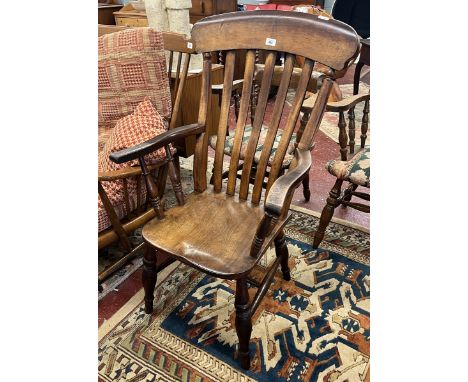 Elm seated stick back armchair 