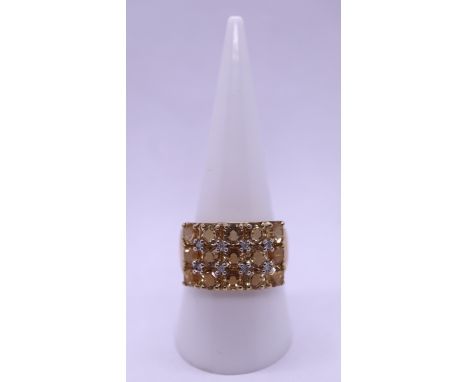 9ct diamond and yellow stone set ring - Weight: 4.3g - Size R 
